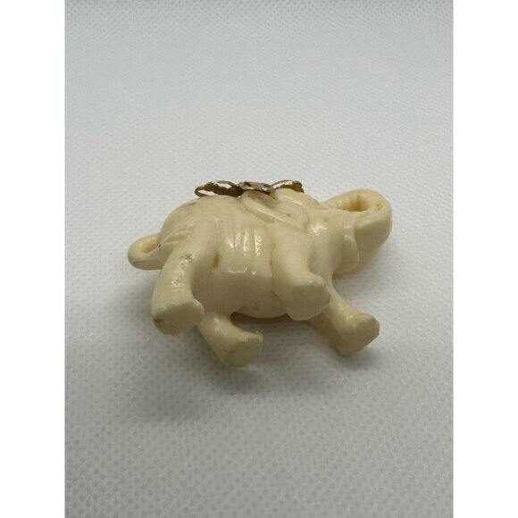 Vintage Elephant Pendant Figurine With Gold-Tone Floral Accents - Picture 3 of 10